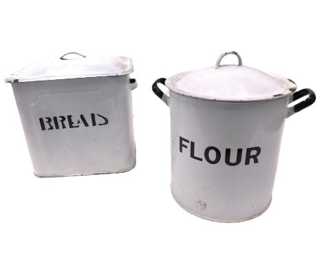 Enamelled kitchen wares, comprising bread and flour bin, each with white and black enamel, 36cm and 34cm high. (2)