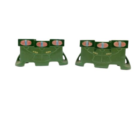 A pair of Eichwald Aesthetic movement Art Nouveau rectangular jardinieres, each decorated in pink and yellow on a green groun