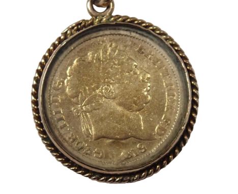 A 9ct gold coin pendant and chain, the graduated curb link neck chain, yellow metal stamped 9ct, 40cm long, with an enamel de
