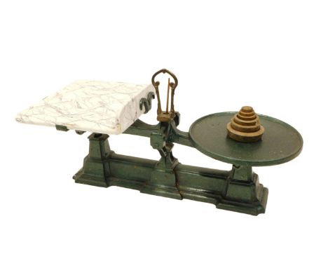 A set of green painted W &amp; T Avery scales, with marbled ceramic platform, and some weights, 57cm wide.
