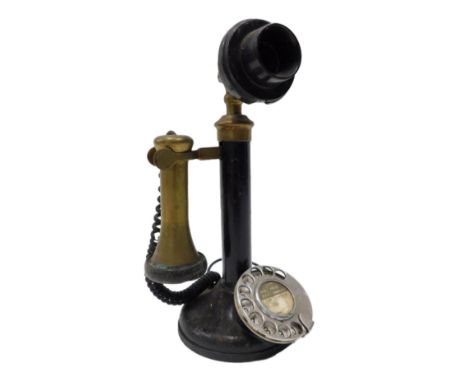 An early ebonised metal and brass candlestick telephone, with brass receiver, numbered to back of speaker PL.234 NO22, 30cm h