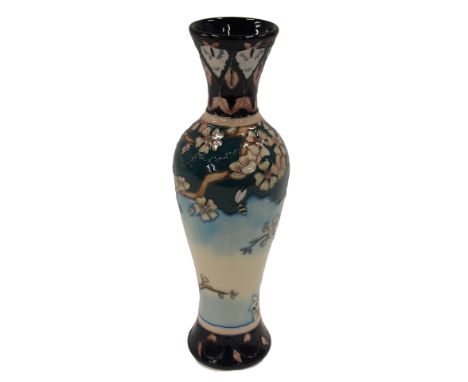 A Moorcroft ceramic vase, decorated with birds, bees, flowers, etc., various marks to underside, to include Angi Davenport co