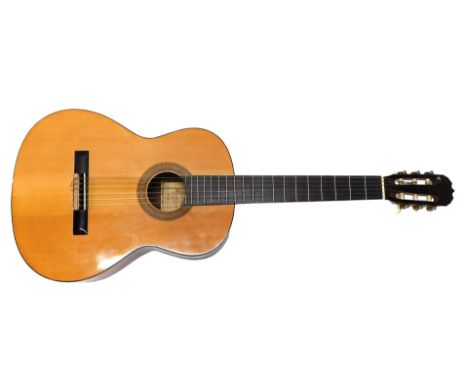 A Hohner acoustic guitar, model HC-06, 100cm high.