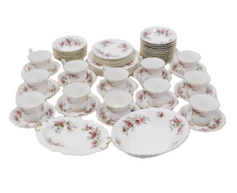 A Royal Albert Lavender Rose pattern part tea service, comprising twelve teacups, thirty two saucers, serving bowl, six mediu