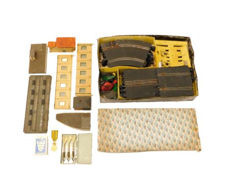 A quantity of OO gauge railway accessories, buildings, Scalextric track etc.