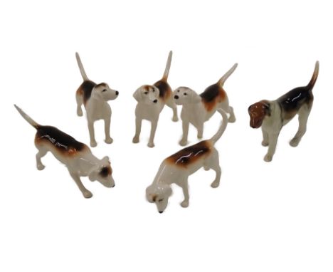 A collection of five Beswick hunting hounds, and another similar.