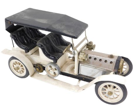 A Mamod steam driven vintage motor car, in cream livery.