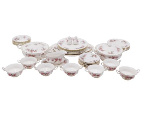 A Royal Albert Lavender Rose pattern part dinner service, comprising two tureens and covers, two graduated meat plates, gravy