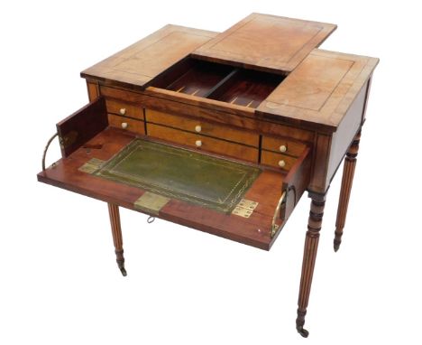 A Regency mahogany games/writing table in Gillows style, the sliding top revealing a backgammon board, above a fitted secreta