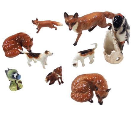 Beswick and other fox figures, two Beswick hunting dogs, a Goebel woodpecker and a Beswick blue tit. (AF)