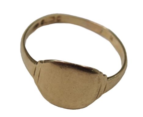 A 9ct gold signet ring, the oval shield of plain design, ring size W½, hallmarks rubbed, 3g.