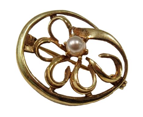 A floral bar brooch, the oval bar set with central petalated flower design and central cultured pearl in a yellow metal frame