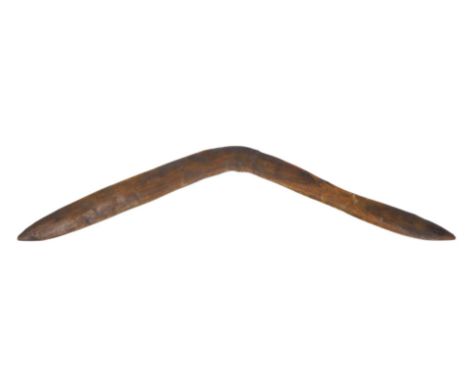 An Australian Aboriginal hardwood boomerang, 56cm wide.