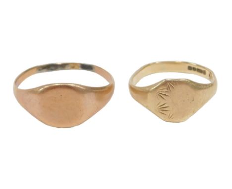 Two signet rings, comprising one of rubbed design stamped 375, ring size L, and a rose gold example, unmarked, ring size T, 4