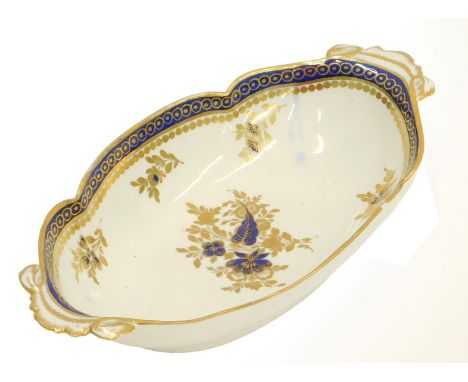 An 18thC Caughley Salopian porcelain pearlware oval dish, with gilt and blue decoration, blue mark to underside and impressed