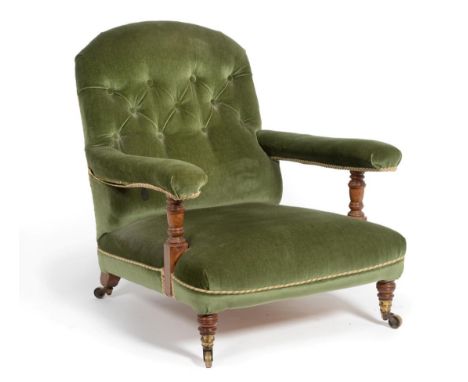 A Victorian Howard & Sons Open Armchair, 3rd quarter 19th century, recovered in button back green velvet with overstuffed arm