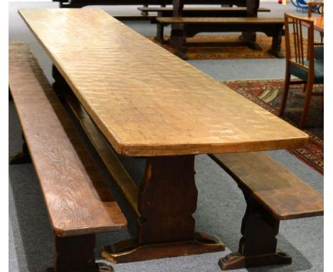 A Robert ''Mouseman'' Thompson Oak 12ft Refectory Table, on two shaped supports, joined by a stretcher, with carved mouse sig