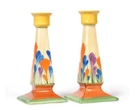 A Pair of Clarice Cliff Crocus Pattern Candlesticks, tapering square section form, with printed marks to base, 20.5cm high Se