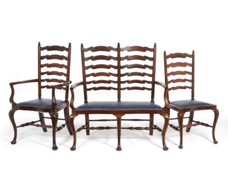 A Set of Eight George III Style Mahogany Ladder Back Dining Chairs, late 19th century, upholstered in close-nailed blue leath