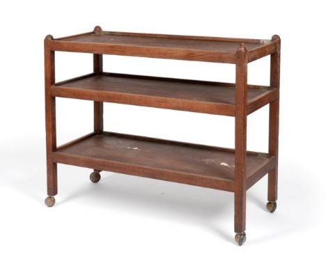 A 1960's Robert ''Mouseman'' Thompson Oak Tea Trolley, each of the three tiers with raised sides with a hinged side fitted wi