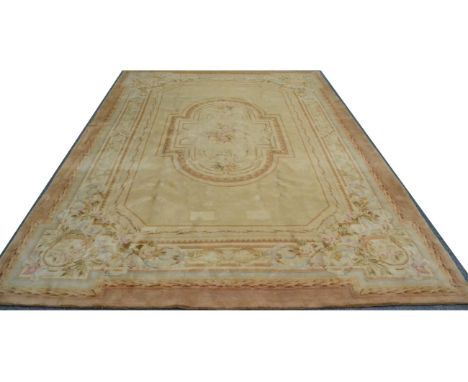 Savonnerie Design Carpet China, circa 2000 The cream field with a central oval floral panel framed by leafy borders, 427cm by