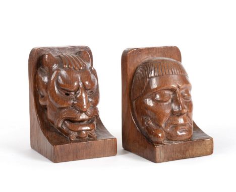 A Pair of Robert ''Mouseman'' Thompson Carved Oak Bookends, one carved with the head of a devil, the other a monk, with carve