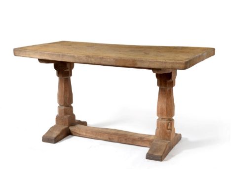 A Robert ''Mouseman'' Thompson Scrubbed Oak 4ft6in Table, the single plank top on two substantial octagonal legs joined by a 