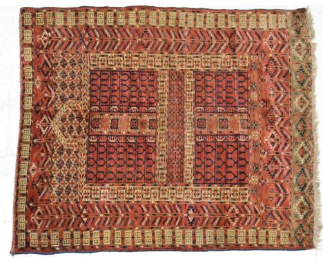 Tekke Ensi Emirate of Bukhara, circa 1900 The madder quartered field of candelabra motifs enclosed by borders of serrated lea