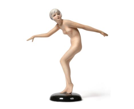 An Art Deco Goldscheider Figure, designed by Josef Lorenzl, circa 1926, model 5802, a female nude with arms outstretched, Art