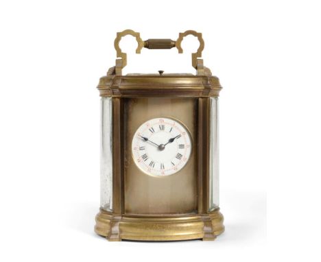 A Brass Striking and Repeating Carriage Clock, circa 1890, carrying handle and repeat button, bowed glass side panels, enamel