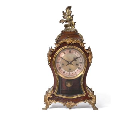 A Mahogany Chiming Table Clock, circa 1890, applied gilt metal scroll mounts, side viewing windows, 8-1/2-inch dial with a si