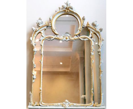 A Victorian Carved Gesso and Parcel Gilt Overmantel Mirror, mid 19th century, with acanthus and flower decorated frame, the r
