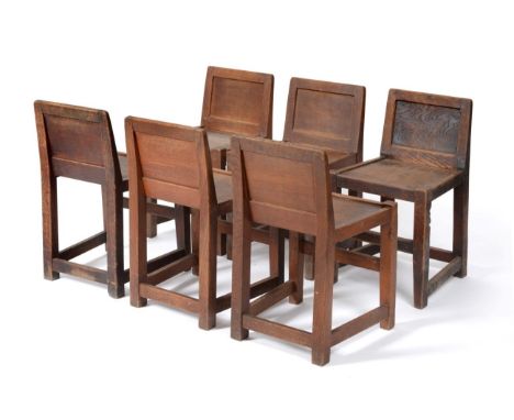 A Set of Six Robert ''Mouseman'' Thompson Oak Panel Back Chairs, solid seats, joined by rails, each with recessed carved mous