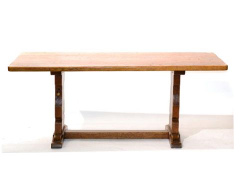 A Robert ''Mouseman'' Thompson Oak 6ft Dowelled Top Rectangular Refectory Table, on two shaped supports, joined by a floor st