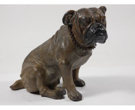 An early 20th century figural 'Striker' table cigarette lighter, in the form of a seated Bulldog, cold painted spelter stampe