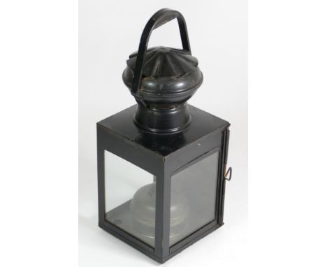 A hand lantern marked 'BR(E)', complete with all glasses and burner.