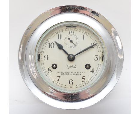 A Henry Browne &amp; Son Ltd bulkhead clock, chromed case with glazed hinged front, silvered dial with Roman numerals, with s