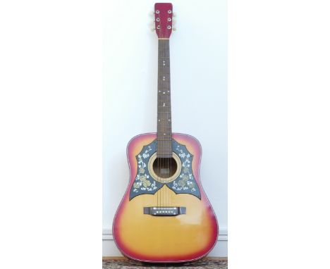 A unbranded acoustic guitar, model No K235, sunburst colourway with twin scratch guards, decorated with florals, 46cm neck 