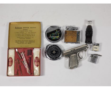 A 1950s Ronson 'Service Outfit' tin with original contents, together with seven 1960s novelty pocket cigarette lighters, petr