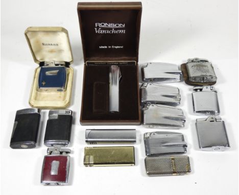 A collection of pocket cigarette lighters, primarily Ronson gas examples. 