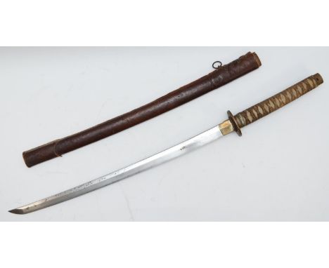 A WWII Japanese Samurai Katana sword, with fish skin and woven cotton hilt, brass tsuba with floral decoration, plain 59cm bl