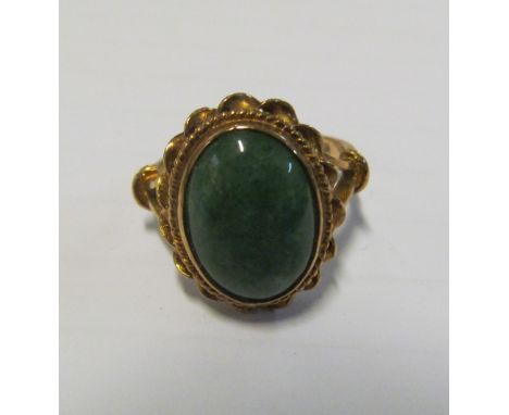 A 9ct ring with jade