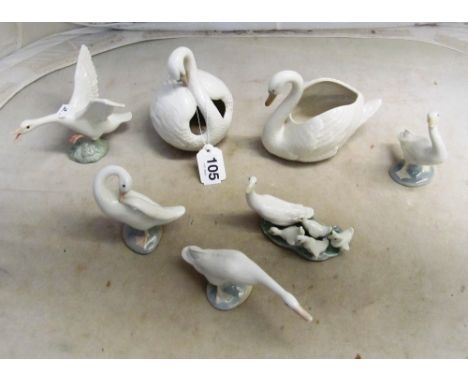 A Lladro swan, Nao swan and five Lladro geese ornaments