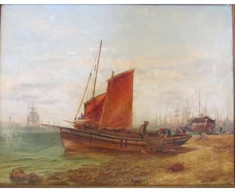 A 19th Century oil fishing boats on shore signed R Jobling and dated 1872 in gilt frame 47cm x 36cm