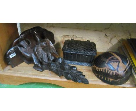 A carved wall bracket bird (slightly a/f), two etched coconut shells and a metal single handled box with lattice pierced top