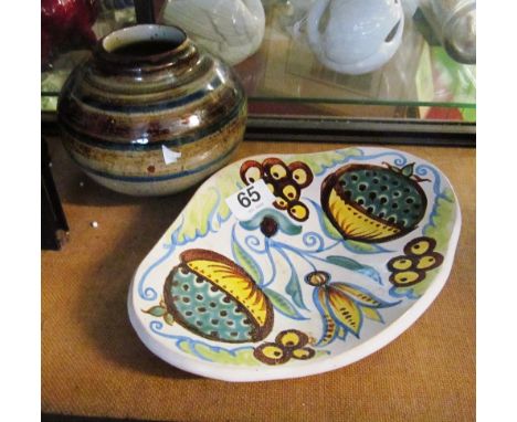 A Donald Mills studio vase, signed and dated 1947 and a large dish floral decoration, signed