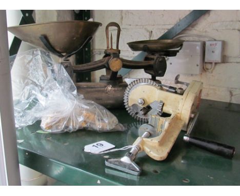 A set of brass scales and weights and a vintage mirror