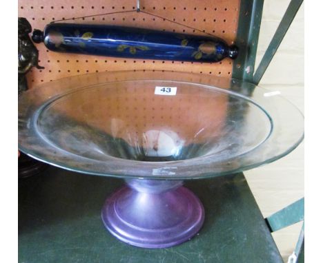 A Norwegian art glass bowl on purple pedestal foot and a Victorian blue glass rolling pin