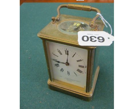 A brass cased carriage clock