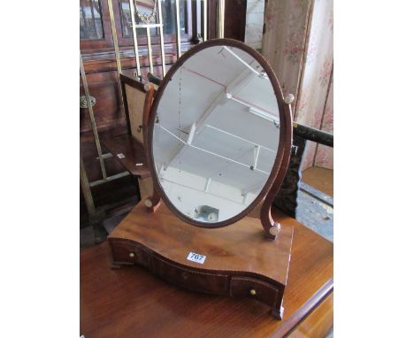 A mahogany swing toilet mirror three drawers and Edwardian oval table